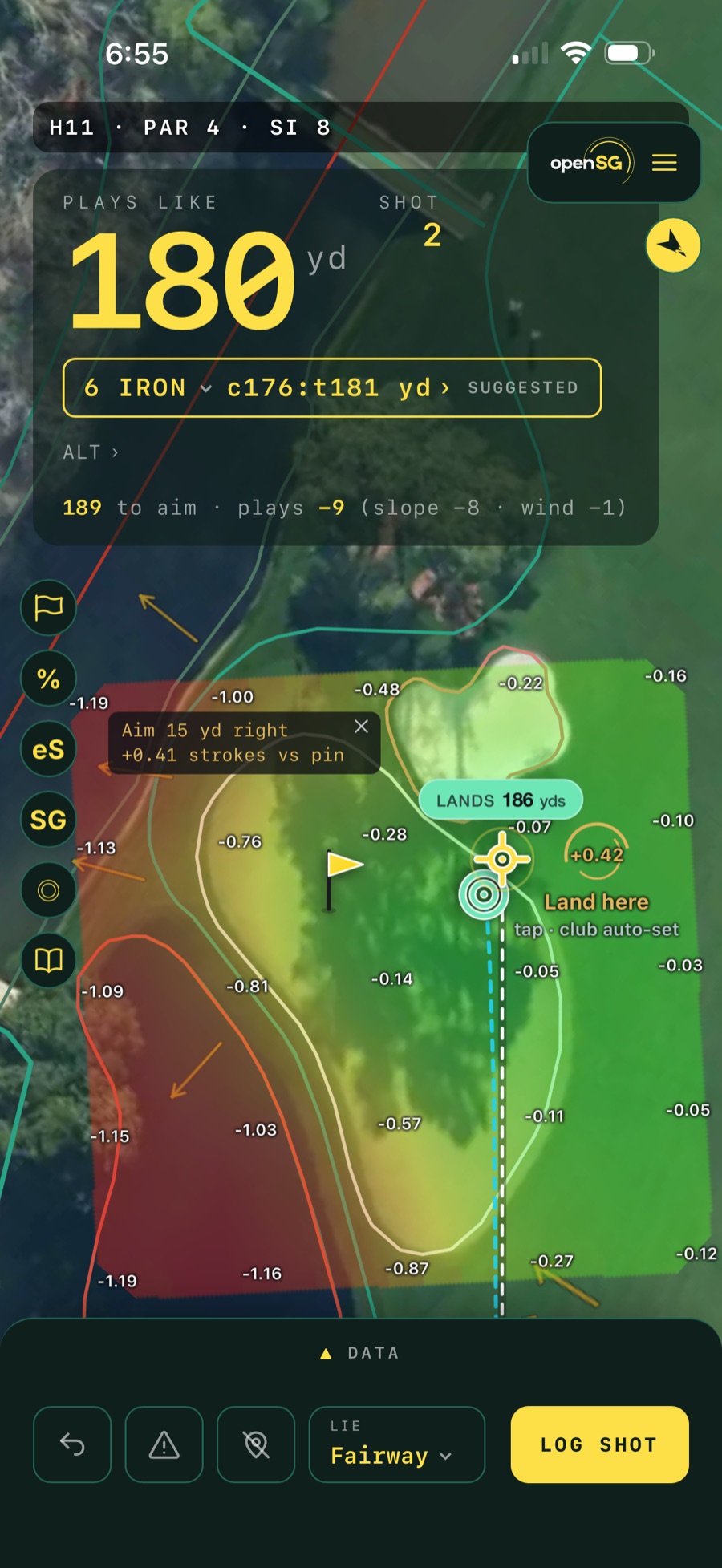 OpenSG spelling out the shift: "Aim 15 yd right — +0.41 strokes vs pin." With water lurking left, moving the whole cloud away from it and toward the safe side is worth nearly half a stroke on this one approach.